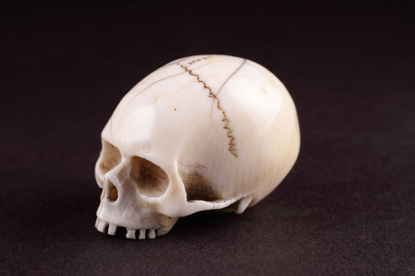 Japanese Carved Ivory Memento Mori Netsuke in the Form of a Skull